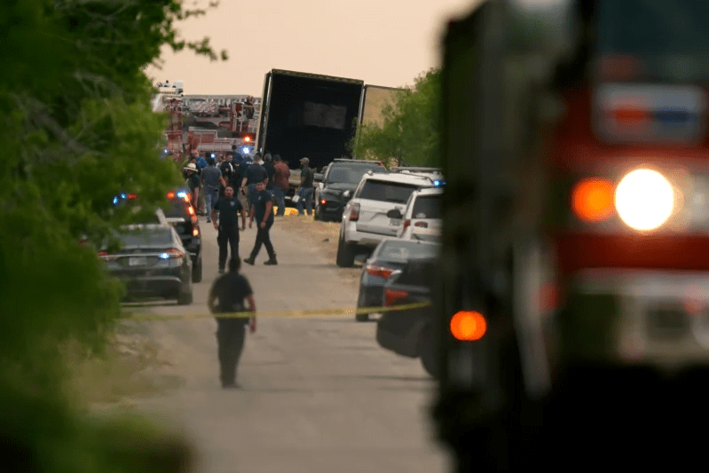 Body bags lie at the scene where a tractor trailer with multiple dead bodies was discovered, Monday, June 27, 2022, in San Antonio.  Eric Gay–AP Photo