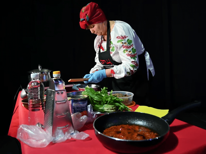 A cook prepares borsch at a March 2021 event in Kyiv to promote Ukraine's bid for UNESCO to recognize the dish as part of the country's historical heritage. Sergei Supinsky/AFP via Getty Images