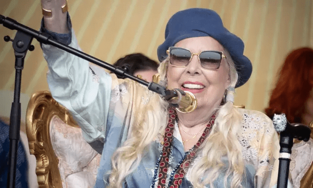 Joni Jam … Mitchell performing at the Newport folk festival on Sunday. Photograph: Douglas Mason/Getty Images