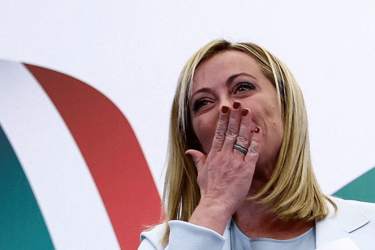 Giorgia Meloni, leader of the Brothers of Italy party, reacts to this week's election results, in Rome on September 26, 2022 [Guglielmo Mangiapane/Reuters]