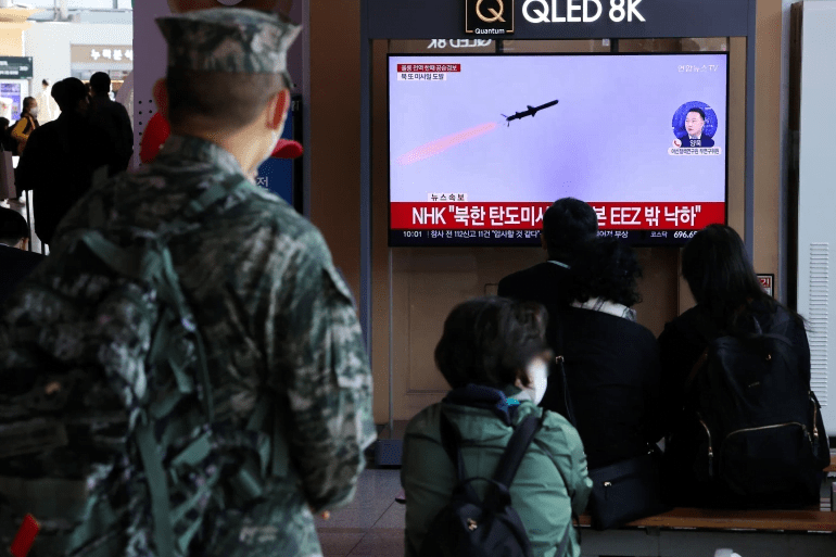 South Korean TV broadcasts a news report on North Korea firing three ballistic missiles into the sea on November 2, 2022 [File: Yonhap via Reuters]