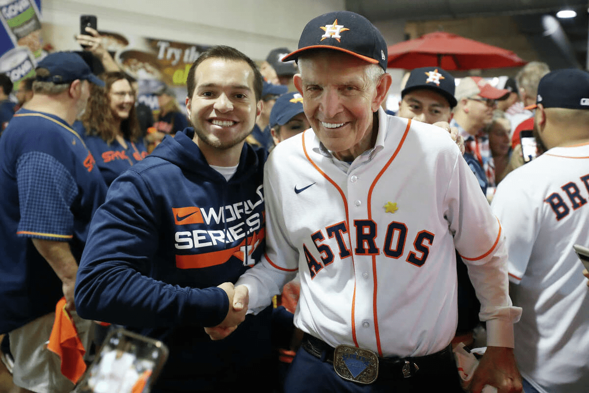 James Franklin McIngvale, also known as "Mattress Mack", poses with fans prior to Game One of the 2022 World Series between the Philadelphia Phillies and the Houston Astros at Minute Maid Park on October 28, 2022 in Houston, Texas. (Photo by Bob Levey/Getty Images) Bob Levey/Getty Images