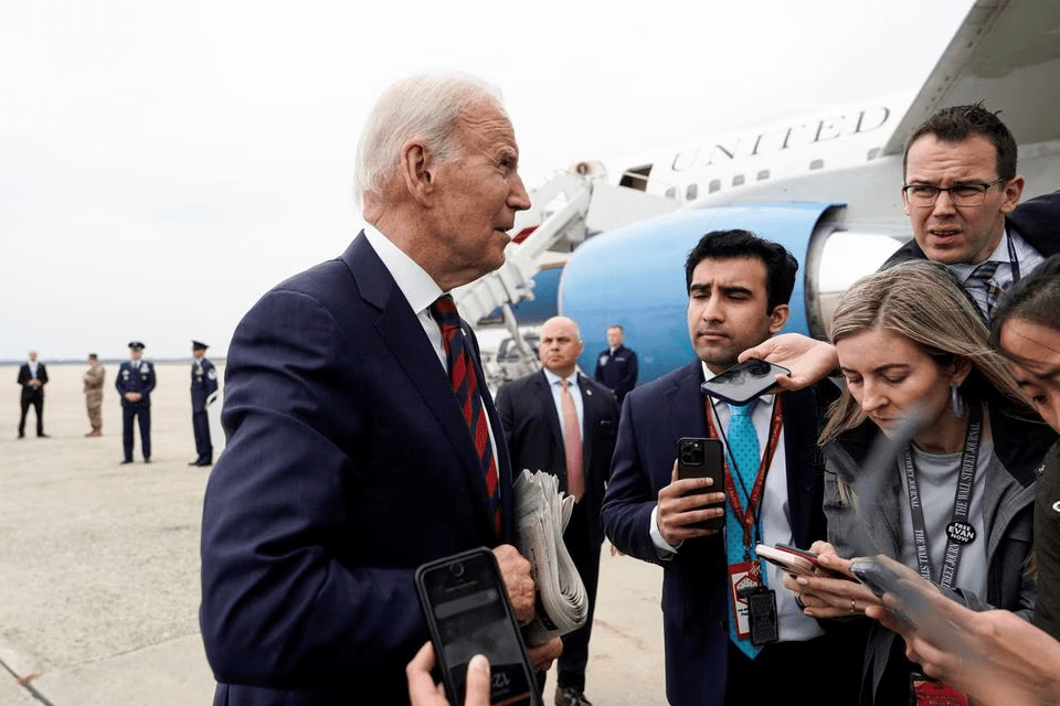 U.S. President Joe Biden speaks to reporters before boarding Air Force One as he departs for Dover, Delaware, from Joint Base Andrews in Maryland, U.S., May 13, 2023. REUTERS/Joshua Roberts