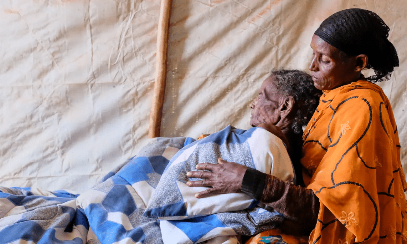 ‘I’m just waiting for her to die’ … Loko and her mother, Saku Shuna, 89, in the camp for people displaced by drought outside Dubuluk in southern Ethiopia. Photograph: Fred Harter